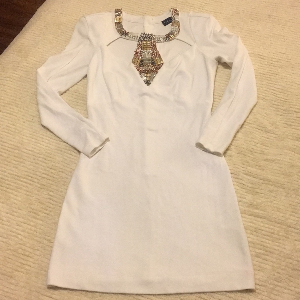 Cream mini-dress with gold detailing